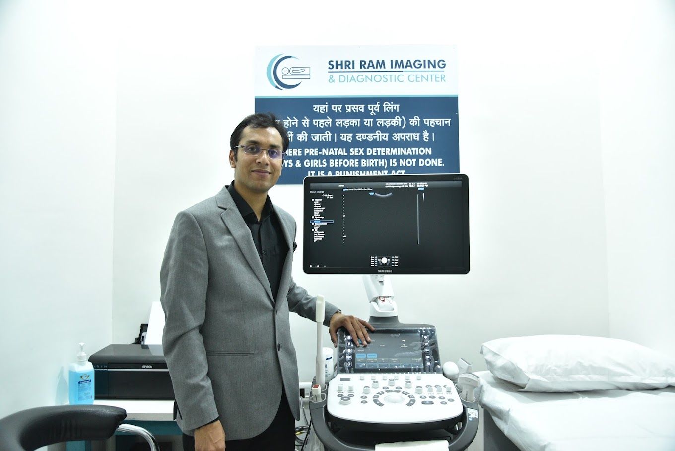 Dr. Anand Bansal, consultant radiologist, with the 5D sonography machine at Shri Ram Imaging, Raipur